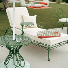 an outdoor seating area with chairs and tables