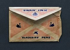 an origami swan ink envelope with blackbird's on the front and back