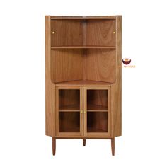 a wooden cabinet with two doors and shelves