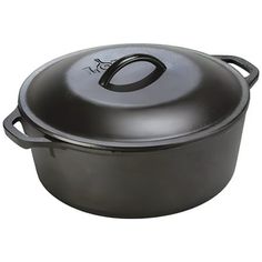 a black pot with a lid and handle on a white background for use in cooking