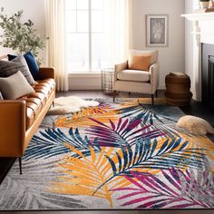 a living room with a couch, chair and rug on the floor in front of a window