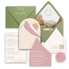 an assortment of wedding stationery and envelopes