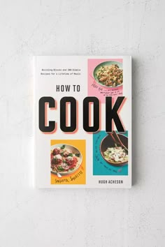 the book how to cook by hugh ackerson is displayed on a white wall