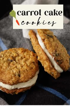 two carrot cake cookies sitting on top of a table