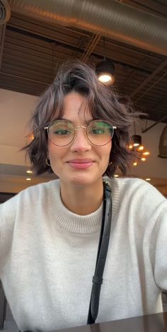 Top 50 Short Bob Hairstyles for Women in 2024 (Detailed Gallery + Video) | 50 Stunning Short Bob Hairstyles for Women Trending in 2024 | Aesthetic Women's Hairstyles & Haircut Inspo Short Hair Sweater Outfit, Short Hair Bob Round Face, Glasses And Short Hair Aesthetic, Glasses And Bob Hair, Styling Glasses Outfit, Haircut With Glasses Short, French Bob With Bangs And Glasses, Style With Glasses Outfit, Bob And Glasses Aesthetic