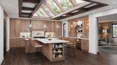 a large kitchen with wooden cabinets and white counter tops