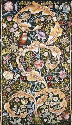 an intricately decorated tapestry with birds and flowers