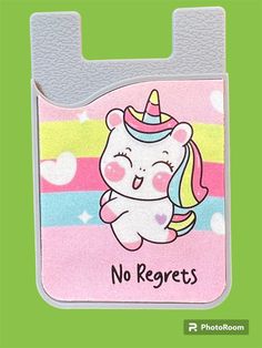 a pink bag with a unicorn on it and the words no regrets written in black