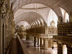 the interior of a large library with many bookshelves