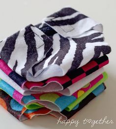 a stack of towels sitting on top of each other