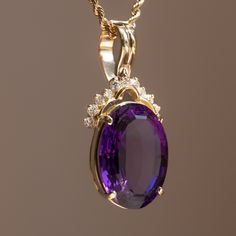 The deep purple of this vintage 14k yellow gold amethyst & diamond pendant just screams royalty. Materials - 14k Yellow Gold, Amethyst, Diamond Dimensions - 38.6mm x 18.7mm Note - Chain not included with purchase *Includes a pearl enhancer clasp on pendant Luxury Elegant Lavender Necklace, Luxury Oval Amethyst Necklace, Purple Pearl Pendant, Luxury 14k Gold Purple Jewelry, Luxury Purple 14k Gold Jewelry, Timeless Round Purple Jewelry, Purple Oval Jewelry With Diamond Accents, Timeless Purple Round Jewelry, Timeless Purple Jewelry For Formal Occasions