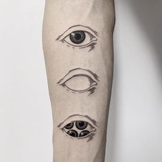 an eye tattoo on the left forearm and right leg, with four different types of eyes