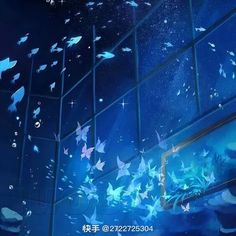 many fish are floating in the air near a building's glass wall and ceiling