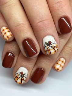 Transform your nails into works of art with our exquisite Fall Nail Art Designs! 🍂✨ Embrace the enchanting beauty of autumn with a stunning array of colors, patterns, and styles that will elevate your manicure game. From cozy sweater-inspired designs to elegant fall foliage, these nail art ideas capture the essence of the season. Explore the warmth of rich hues, playful accents, #FallNailArt #AutumnElegance #NailDesignInspiration 🍂✨ Fall Nails Scarecrow, Fall Plaid Pumpkin Nails, Fall Nails Ideas Autumn Plaid, Pumpkin Plaid Nails, Fall Harvest Nail Designs, Thanksgiving Plaid Nails, Plaid Pumpkin Nails, August Gel Nails Ideas, Pumpkin Gel Nails