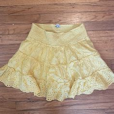 Super Cute Ruffle Eyelet Yellow Skirt Never Worn Perfect Condition Open To Offers! Flowy Yellow Ruffled Skirt, Yellow Ruffled Bottoms For Day Out, Yellow Ruffled Bottoms For Spring, Light Yellow Skirt, Orange Skirts, Yellow Skirts, Outfit Repeater, Wonder Pets, Sun Belt