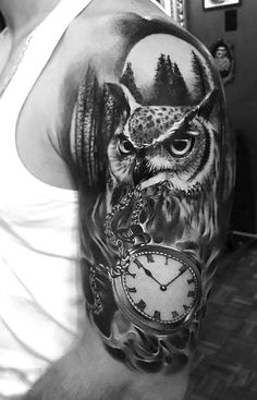 a man with an owl and clock tattoo on his arm