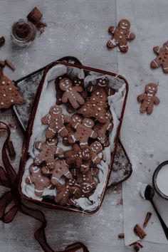 gingerbread cookies and milk on a table