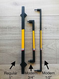 measurements for the front and rear door handles on a wooden floor with arrows pointing to them