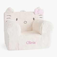 a white hello kitty chair with a pink bow on it's head and name