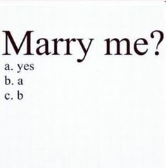 the words marry me are written in black and white on a sheet of paper,