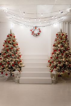 two christmas trees are decorated with red and white ornaments