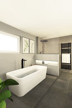 a large white bath tub sitting inside of a bathroom