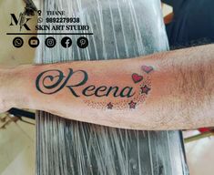 a man with a tattoo on his arm that says rena and hearts in it