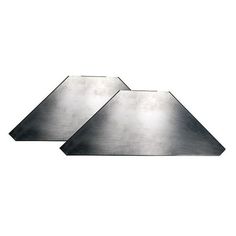 three pieces of metal on a white background with clippings to the left and right sides