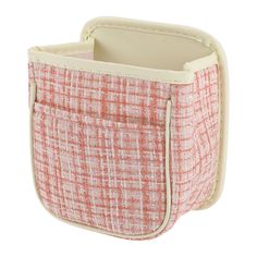 an orange and white checkered fabric storage bag