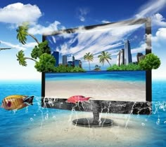 a computer screen with an image of a tropical island and fish swimming in the water