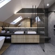 an attic bathroom with skylights and modern fixtures