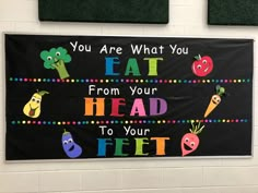 a bulletin board that says you are what you eat from your head to your feet