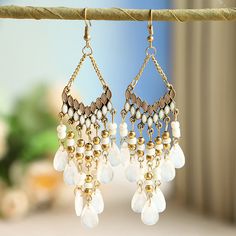 Category: Earrings Material: Alloy Fashion Element: null Style: Classic style Boho Beaded Earrings, Beaded Tassel Earrings, Gem Earrings, Ear Clips, Daisy Earrings, Hanging Earrings, Red Crystals, Gothic Jewelry, Beaded Tassels