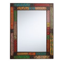 a mirror that is made out of different colored tiles and has a decorative frame around it