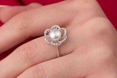 Our art deco pearl ring is 14k solid white gold. Its flower leaves are decorated with zircon stones that look fascinating. The big pearl is settled in the middle of the flower. When you think of this big pearl ring as a gift for your loved ones, it will be a great gift choice. Our gold pearl ring makes happy your loved ones on their birthdays, graduations, anniversaries, mother's day, valentine's day, or women's day. 🎁 If you want, you can add a gift note for your loved ones. It arrives in a sp Luxury Round Cut Pearl Promise Ring, Pearl Anniversary Rings, Luxury Pearl Ring For Wedding, Luxury White Pearl Promise Ring, Luxury Rose Gold Pearl Ring In Fine Jewelry Style, Luxury Minimalist Pearl Ring For Anniversary, Elegant Engagement Rings Peal, Luxury White Pearl Ring In Romantic Style, Luxury Elegant Pearl Ring With Round Band