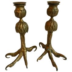 pair of brass candlesticks with octopus legs