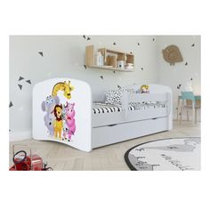 a child's bedroom with white furniture and wall decals