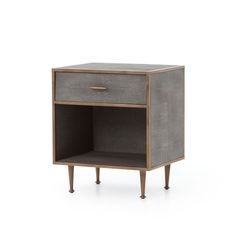 an end table with two drawers and one drawer on the bottom, in grey fabric