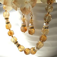 "7238 7239 Citrine Pearl Necklace Earrings natural yellow white gemstones boho statement choker dangle drops birthday anniversary Christmas holiday gift for her women mom sister wife girlfriend daughter niece aunt grandma cousin colleague best friend. Enjoy the beauty & power of natural gemstones.  This listing is for the NECKLACE or SET  Earrings listed separately at https://www.etsy.com/ca/listing/1592320917/citrine-pearl-earrings-natural-yellow?click_key=575dcc50f0db40e434962e291ea773a2caf391 Sister Wife, Statement Choker, Pearl Necklace Earrings, Mom And Sister, Holiday Christmas Gifts, Custom Earrings, Round Beads, Citrine, Jewelry Sets