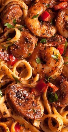 pasta with shrimp and peppers in a pan