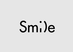 the word smile written in black on a white background