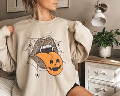 Halloween Lips | Halloween Sweatshirt, Halloween Shirt, Fall Sweatshirt For Women ❤️ Every shirt is hand printed to order, we put so much love into making each shirt (we don't use cheap iron on vinyls) ❤️ If for any reason the shirt didn't live up to your quality standards, contact us and we'll replace it or refund it ❤️ Feel free to send us your special request or if you have a unique idea for a shirt So it's that time again. You need to look for a new shirt to wear with your favorite jeans... Halloween Lips, Plaid And Leopard, Halloween Tattoo, Leopard Shirt, Women Sweatshirt, Sweatshirt Halloween, Sweatshirt For Women, Gildan Sweatshirts