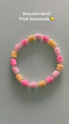 the bracelet is made with pink, yellow and orange beads on a gray background text reads bracelet idea pink lemonade