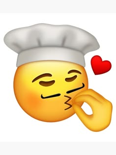 an emoticive smiley face with a chef's hat on and a red heart