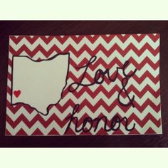 a red and white chevron pattern with the state of texas on it