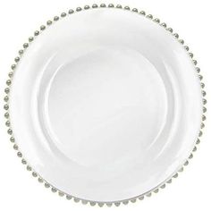 an empty white plate with silver beads on the rim and bottom, isolated against a white background