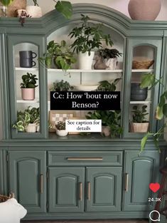 a green china cabinet with potted plants on top and a sign that says c g how bout now beson?