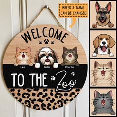 a wooden sign that says welcome to the zoo with dogs and cats in different colors