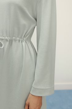 Whether you wear this piece as a nightgown or a lounge dress is entirely up to you: our Ribbed Drawstring Waist Dress is relaxed, roomy, and designed to be a comfortable home style you can wear whenever and however you need. Made from a soft blend of cotton and modal, slip into this style’s blissful embrace after a long day and feel the stress of your day melt away. Details Materials & Care Shipping & Returns • Boat neck, long sleeve, below-the-knee hemline.• Relaxed style, crafted to fit any bo Drawstring Waist Dress, Boat Neck Long Sleeve, Comfortable Home, Lounge Dress, Home Style, Waist Dress, Grey Cotton, Relaxed Style, Boat Neck