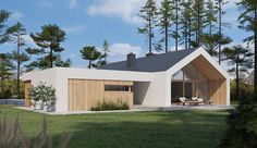 a modern house in the woods on a sunny day with grass and trees around it